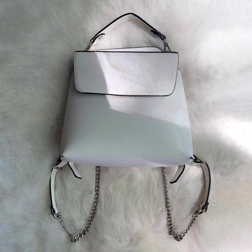 White square backpack with chains
